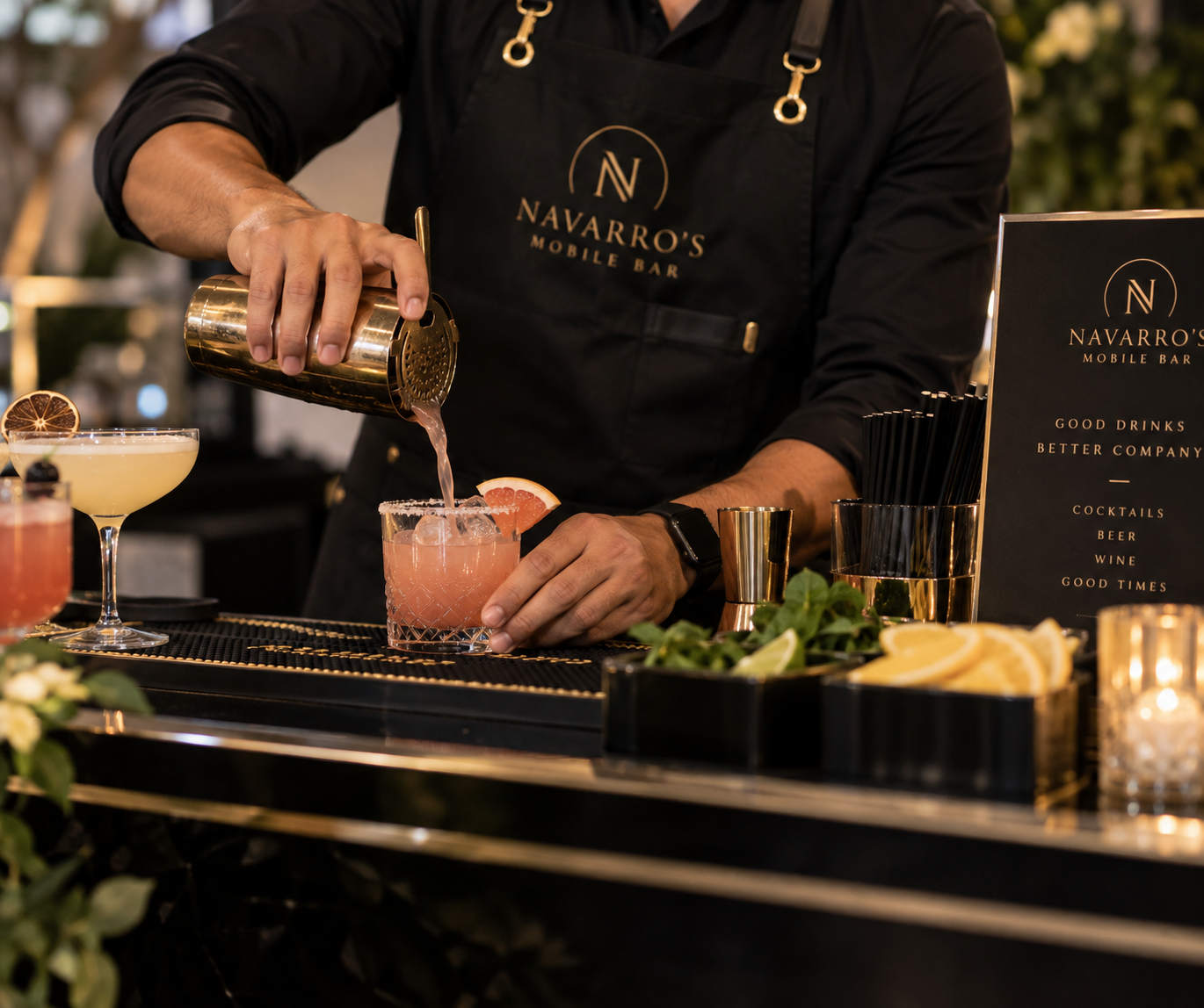Navarro’s Mobile Bar bartender preparing cocktails at a luxury mobile bar.